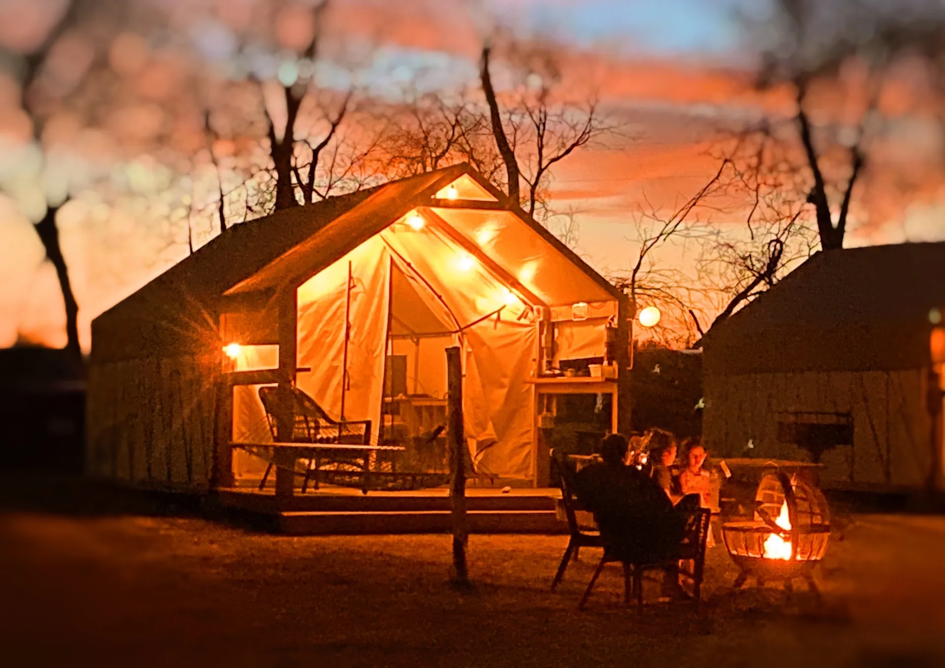 Summer weekend trip from Austin — sunset over riverfront glamping