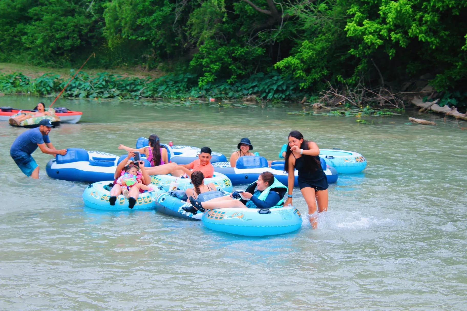 Friends tubing in a group