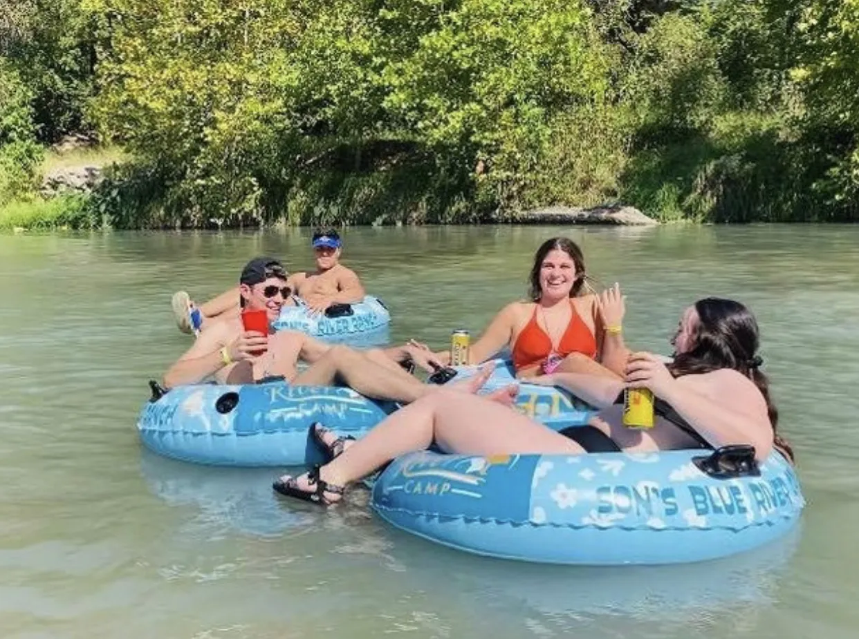 Group of friends tubing together