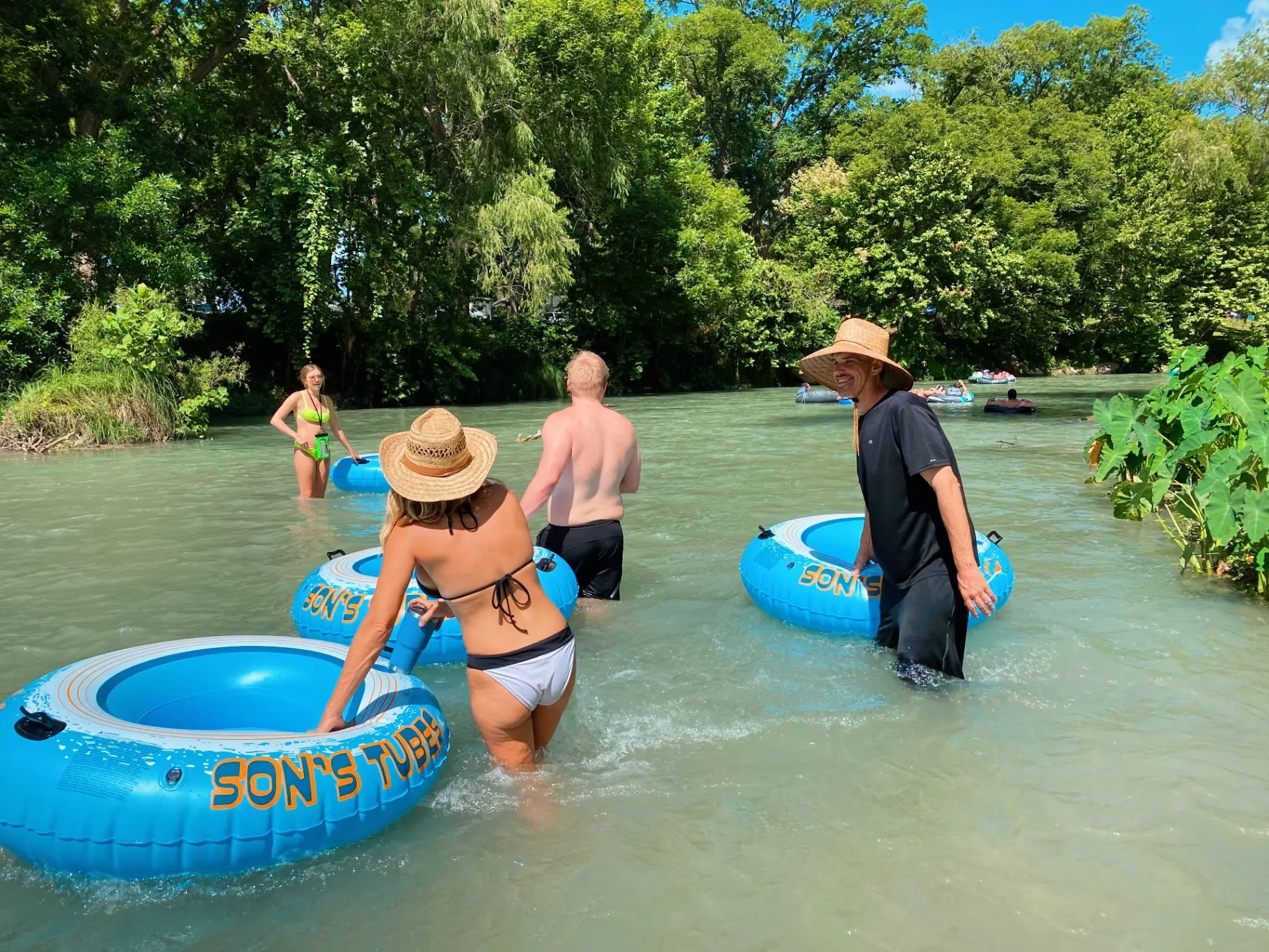 Group tubing with Son's Blue River Camp tubes