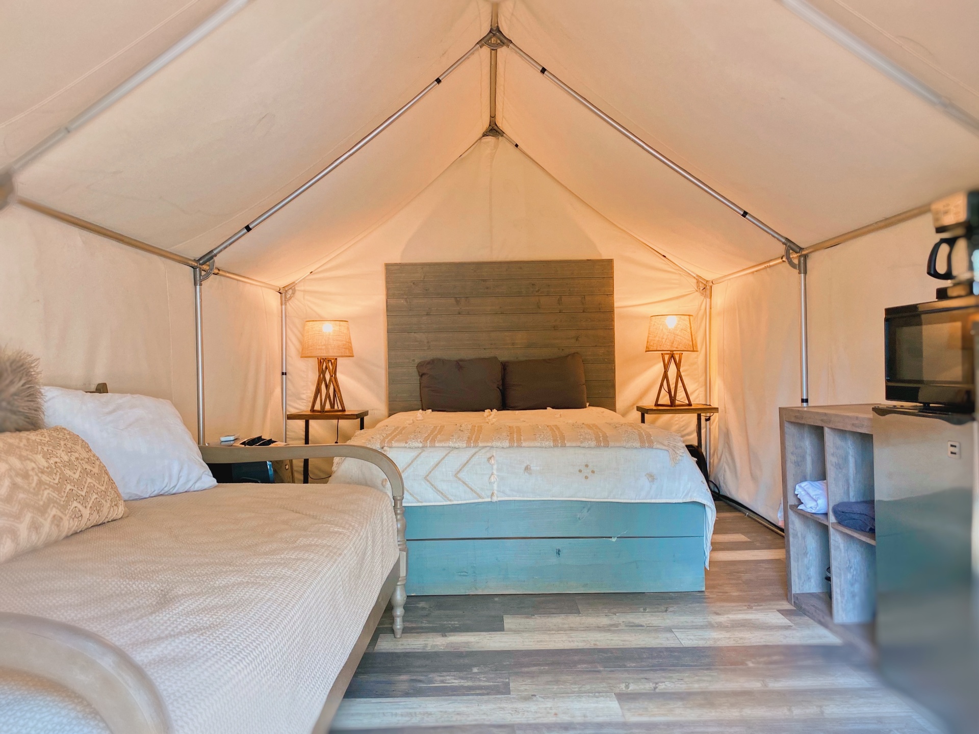Luxury Glamping Cabin interior with beds