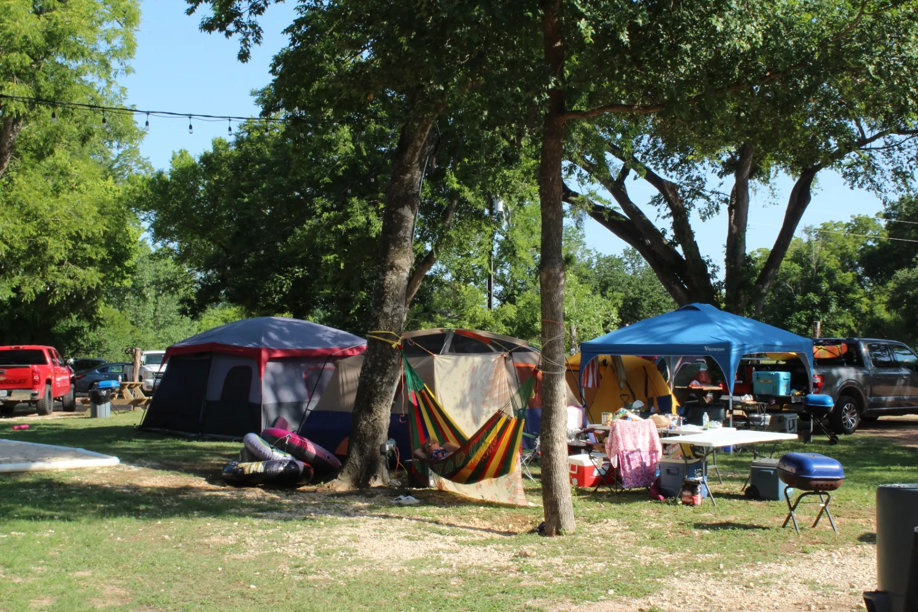 Family camping with hammock