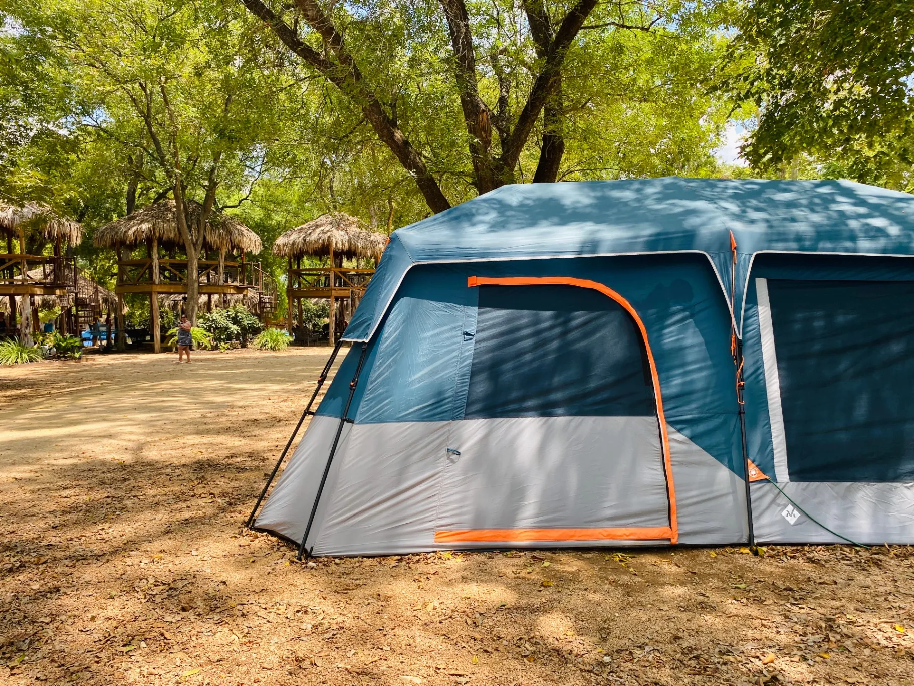 Tent camping with tiki hut shade on the San Marcos River