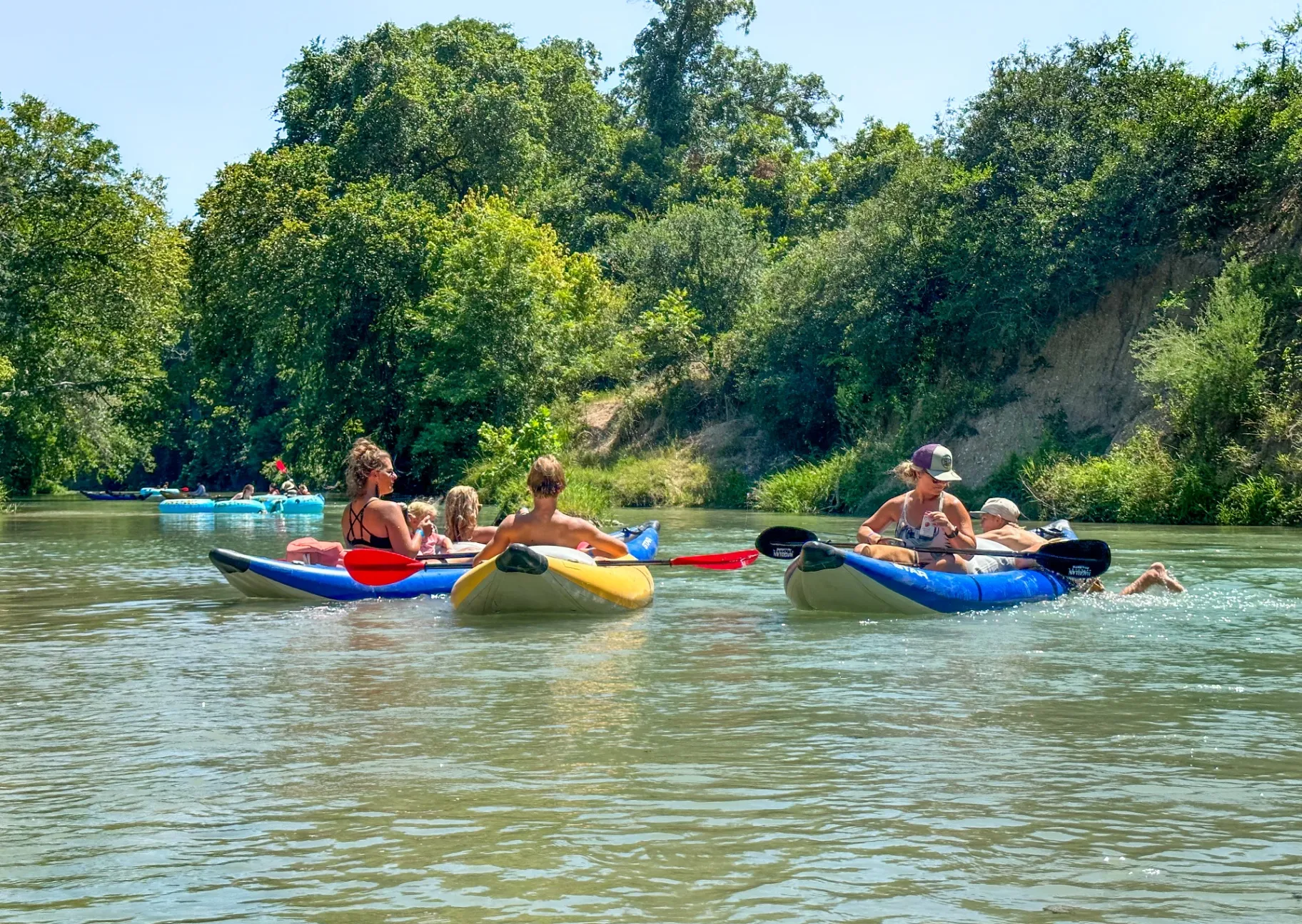 Families kayaking together